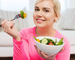 person eating a healthy salad