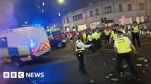 Four arrested and officer hurt in violent disorder