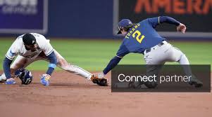 Licensable picture: Milwaukee Brewers second baseman Brice Turang (2) makes the tag on Tampa Bay Rays outfielder Chandler Simpson (14) who was