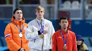 Watch Jordan Stolz get his first Olympic gold medal at ceremony