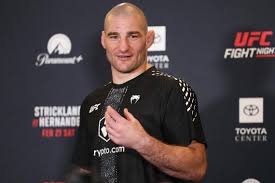 UFC lightweight says Sean Strickland tried to fight him and his coach within half hour of them meeting