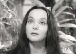Identified by Jane Considine: Morticia Addams (Carolyn Jones): The Addams Family. - mom64
