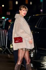 Taylor Swift Performs ‘Aunt Tay’ Duties in a Luxe Winter Coat of Many Fall Colors