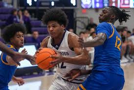 Photos: Holy Cross men's basketball runs past Worcester State