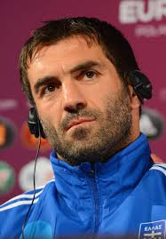 In this handout image provided by UEFA, Greece captain Giorgos Karagounis talks to the media during a press conference ... - Giorgos%2BKaragounis%2BGreece%2BTraining%2BPress%2BConference%2B30BH549tm2Cl