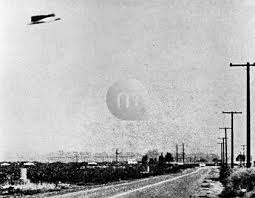 Bildagentur | mauritius images | On 3rd August 1965, Rex Heflin took three pH๏τographs of a UFO, using a Polaroid camera, through the windscreen of his truck (he was a highway traffic