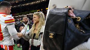 Chiefs wife wins $6,700 Chanel purse at Taylor Swift and Travis Kelce's wedding