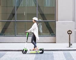 Image of someone riding a Lime scooter in LA