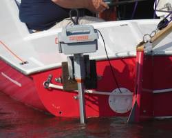 Image of Outboard motor bracket on a sailing boat