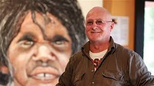 Artist William Snell with one of his portraits at the McCormick Centre near Renmark (Catherine Heuzenroeder - ABC Local) - r1003145_11224745