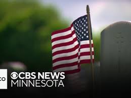 Volunteers set out to lay flags on every headstone at Fort Snelling National Cemetery