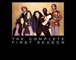 Saturday Night Live original cast 1975 Chevy Chase Dan Aykroyd John Belushi Gilda Radner SNL Studio 8H stage iconic sketches Weekend Update set 1970s TV history, AI generated