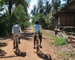 Image of People entering Battambang Airport on motorbikes