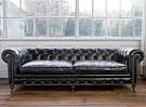 Black leather chesterfield sofa