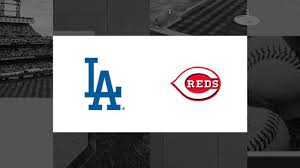 Los Angeles Dodgers and Cincinnati Reds players preparing for an MLB game