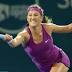 Victoria Azarenka plays a forehand during her quarter-final against  ...