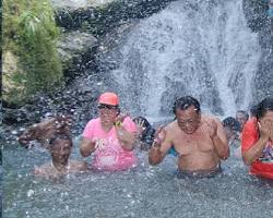 Swimming in Bocay-il Falls
