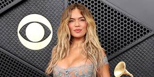 Karol G Heats Up the Grammys 2026 Red Carpet in Fully Sheer Gown