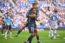 Real Madrid survive after Huijsen red card to seal hard-fought win against Real Sociedad