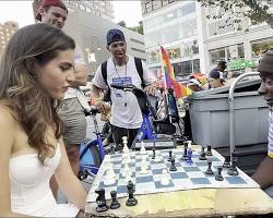 Image of Union Square Park in NYC with chess hustlers