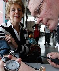 QUICK AND PAINLESS: Ella Collier has her blood pressure checked by St John ... - 9252586