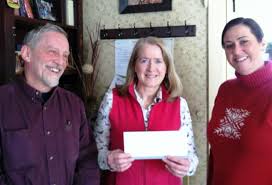 <b>Sarah Foulger</b> of the Boothbay Region Community Resources Group with a check <b>...</b> - Community%252BFuel%252BChallenge%252B20141