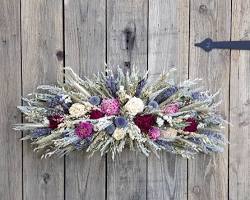 Various dried flower arrangements: bouquet, swagg, wreathの画像