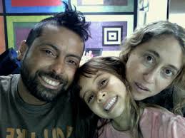 Rowan Jimenez poses with his wife and daughter. - rowan-400-11022012_0