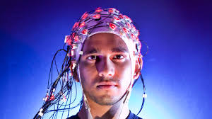 ... of Maryland Ph.D. student wears the Brain Cap, a non-invasive, sensor-lined cap with neural interface software.University of Maryland, John Consoli - BrainCapC