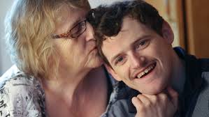 Louise Drover kisses her son Graham, who has Angelman Syndrome, at their home in Blaketown. (Paul Daly/Canadian Press). When the stress and uncertainty of ... - li-cp-drover-louise-201105