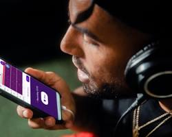 Image of person using a voice command to operate a copier machine