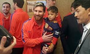 Image result for Messi meets Afghan boy who made football shirt out of plastic bag