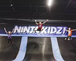 Image of Children jumping into a foam pit at Ninja Kidz Action Park Hammond