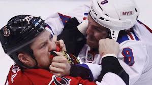 Ottawa Senators&#39; Chris Neil (L) fights with New York Rangers&#39; Brandon Prust during the first period of Game 6 of their NHL Eastern Conference quarter-final ... - Senators6