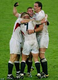 Happier times: Cohen with Jason Leonard, Neil Back and Martin Johnson after their historic World Cup win over Australia - article-0-006BACD91000044C-28_468x644