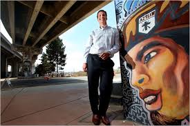 The developer Kevin McCook next to a support column of the Coronado Bridge ... - BARRIO-popup