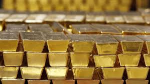 Gold slips as dollar and bond yields weigh