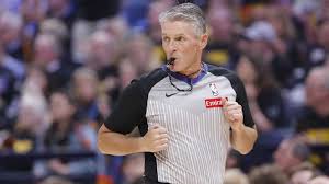 Scott Foster officiating a basketball game