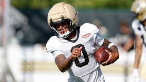 Jordyn Tyson warming up on the football field