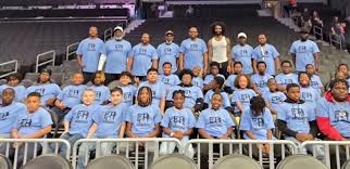 Coby White meets with local students before game