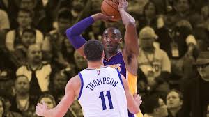 Klay Thompson displaying his signed Kobe Bryant jersey