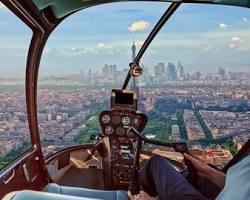 Image of luxury mini helicopter flying over Paris