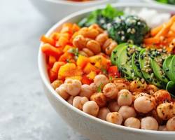 Image of vibrant plantbased diet bowl with avocado chickpeas quinoa kale and colorful vegetables 2026 healthy lifestyle photo