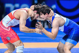 Lee, Haines, Hidlay advance to men’s freestyle semis at World Championships