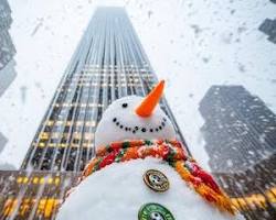 Image of snowman in an urban setting