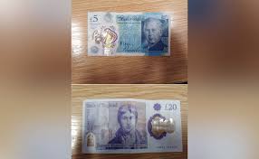 Taxi driver takes customer who paid with fake cash to police
