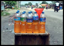 Petrol being sold illegally in plastic bottles in Naxalbari