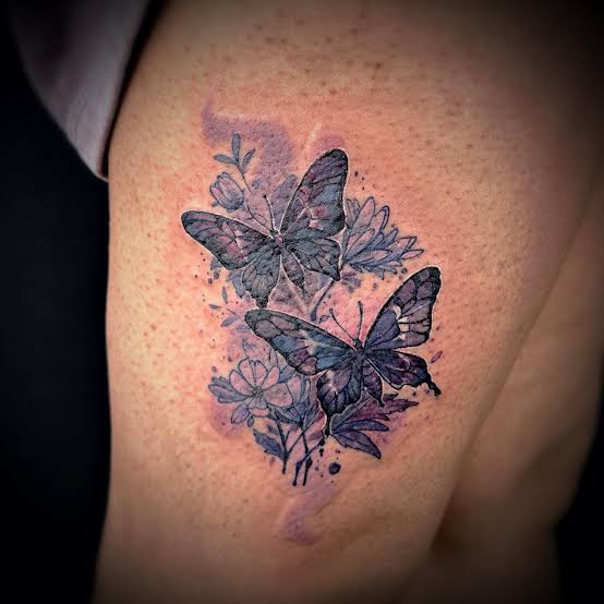 Butterfly thigh tattoo in purple For For enquiries, please visit ...