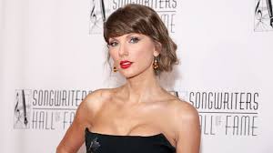 Travis Kelce joins Taylor Swift for Songwriters Hall of Fame induction