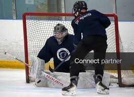 Licensable picture: Jayna Bowen blocks shots by Gulf Coast Flames Hockey Club teammates recently during practice at the Ellenton Ice and Sports